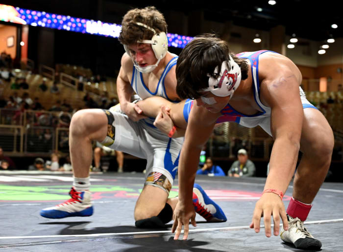 Anderson Heap from Osceola wins the 150-pound championship against Dallas Russell of Jefferson on Saturday at the Knockout Christmas Classic at Silver Spurs Arena in Kissimmee.